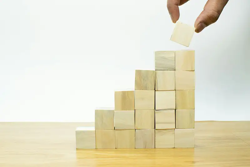 Digital marketer analyzing keywords and SEO performance metrics